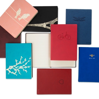 Inspire creativity and encourage an aspiring writer - or give them a stylish place to jot down notes with a personalized essential journal. Available in seven whimsical covers, these premium leather-like journals measure 5" x 1" x 7". The simple cover designs include a dragonfly, peach birds, bicycle, cherry blossom, bee, Eiffel Tower, and heart. Add their name, first or last initial or monogram to make this journal uniquely theirs-Personalize on the front or corner of the cover-Available in seven unique covers-A perfect birthday, holiday or business gift for anyone-A great gift for the graduate or aspiring writer! Eccolo Essential Journals, In Peach, Leather/Paper, By Things Remembered