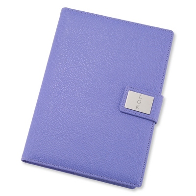 Stay on top of notes, lists and everything worth writing down with our personalized Medium Purple Pebble Grain Journal. Solid and sleek, the leatherette journal is filled with 120 sheets of lined paper for all your jotting needs. Engrave a monogram, date or job role on the front plate for a bonus personal touch. -Size: 6.5" W x 8.7" H x 1.4" D -Material: Leatherette, Paper -Inspiration: A great gift for a recent graduate, new coworker or friend. Medium Purple Pebble Grain Journal, By Things Remembered.