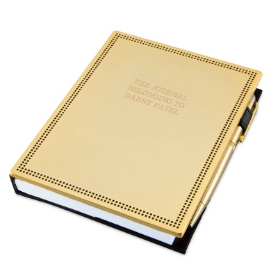 Make sure they have a place to jot down every important note with our Gold Journal and Pen Set. The journal features a gold stainless steel cover with a beaded border and comes with a gold ballpoint pen for a complete office set. Engrave both the journal and pen with a name, message, significant date or favorite quote. -Contents: Includes 136-page journal and pen -Size: 5.1" W x 6.7" H x 1" D; 136 pages of paper -Material: Stainless Steel, Paper -Inspiration: A great gift for a graduation, new job, promotion or work anniversary. Gold Journal And Pen Set, By Things Remembered.